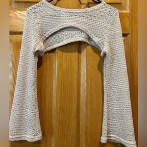 Knitted beige long-sleeve cover